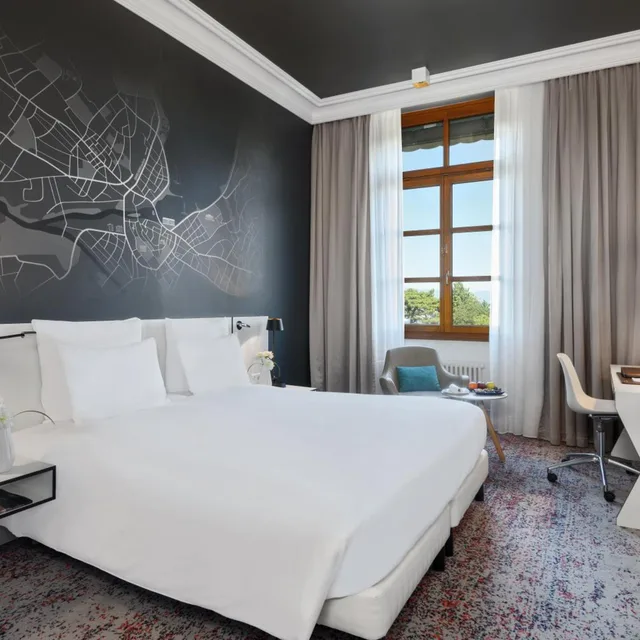 غرفة ديلوكس بإطلالة على البحيرة، Hotel Metropole Geneve 2/9