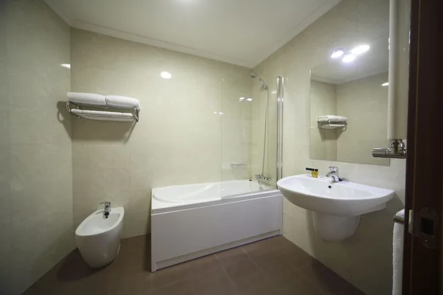 غرفة بسريرين منفصلين، Capitol Boutique Hotel 7/9