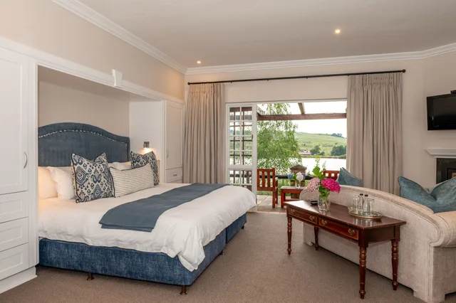 غرفة فاخرة بسريرين منفصلين، Walkersons Hotel Spa 1/10