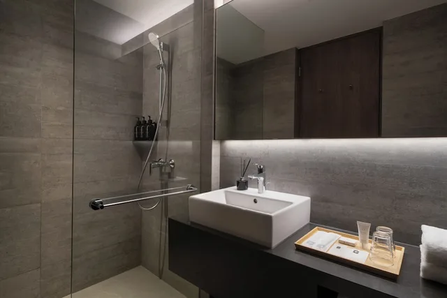 جناح جونيور بسرير كينج مع أريكة، Oakwood Bencoolen Singapore 7/7