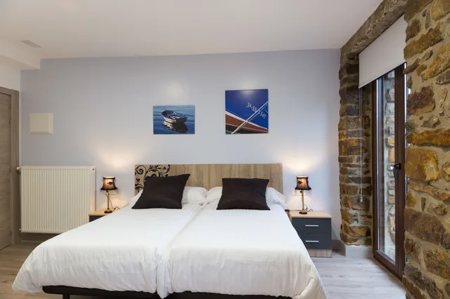 غرفة ثلاثية بثلاثة أسرّة بشرفة، Petit Hotel Goierri 1/4