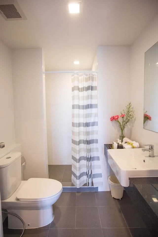غرفة ديلوكس ثلاثية بسرير كوين وسرير فردي، Connext Residence 7/10