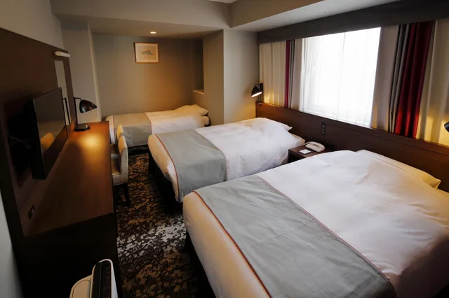 غرفة ثلاثية بسريرين منفصلين مع سرير إضافي، Hotel Monte Hermana Fukuoka 4/10