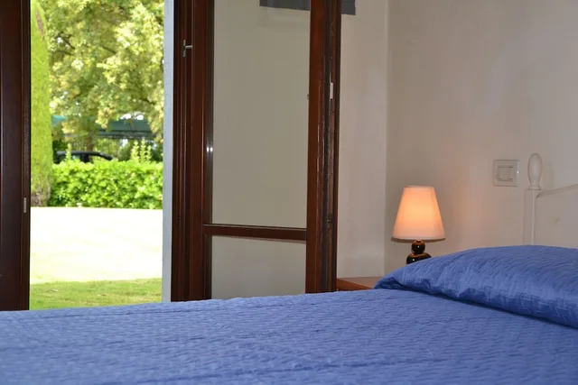 شقة بسرير بطابقين وسرير كوين بغرفتي نوم مع أريكة، Residence Garda Resort 5/8