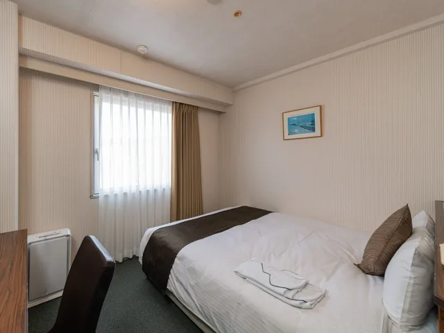 غرفة بسرير كوين، Alpico Plaza Hotel 1/5