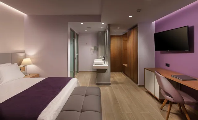 غرفة بسرير مزدوج أو سريرين منفصلين مع أريكة، Oscar Hotel and Apartments 3/6