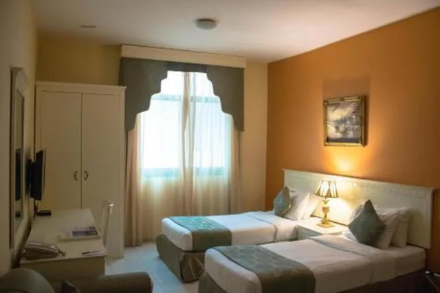 جناح استوديو بسريرين منفصلين، Al Maha Regency Hotel Suites 7/10