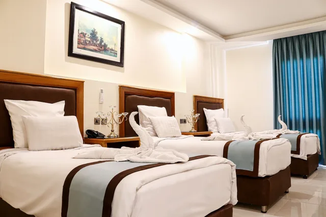 غرفة ثلاثية بثلاثة أسرّة، Raed Hotel Suites 1/10