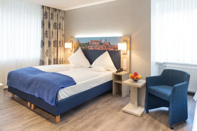 غرفة ثلاثية، Ringhotel Loew S Merkur 2/2