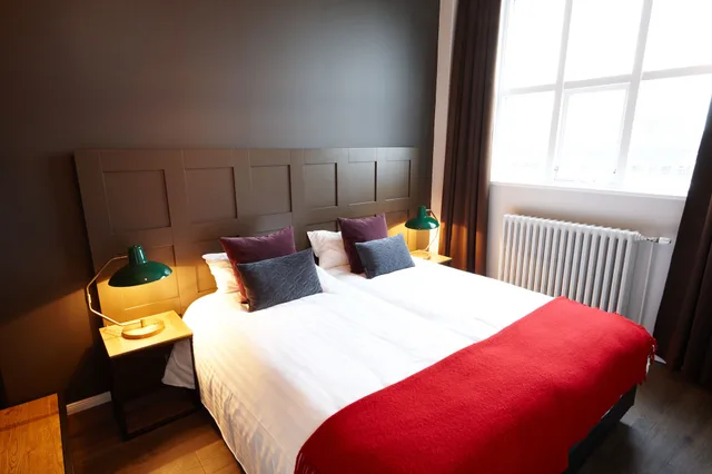 جناح عائلي بسريرين منفصلين وأسرّة بطابقين مع أريكة، Fosshotel Baron 3/4