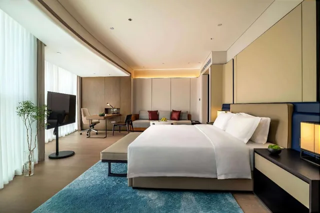 جناح عائلي بسرير كينج وسرير فردي بإطلالة على النهر، Wyndham Grand Plaza Royale Yujia Anhua 1/1