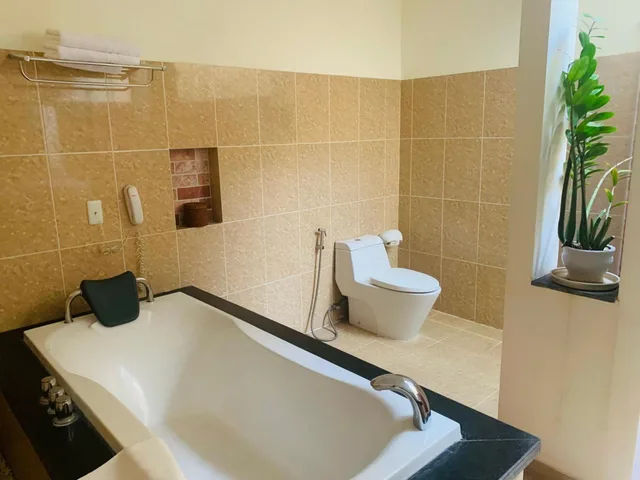 غرفة ديلوكس بسرير مزدوج أو سريرين منفصلين، Vietstar Resort Spa 6/6