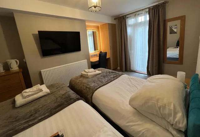 غرفة اقتصادية بسرير مزدوج أو سريرين منفصلين، Hedley House Hotel 3/4