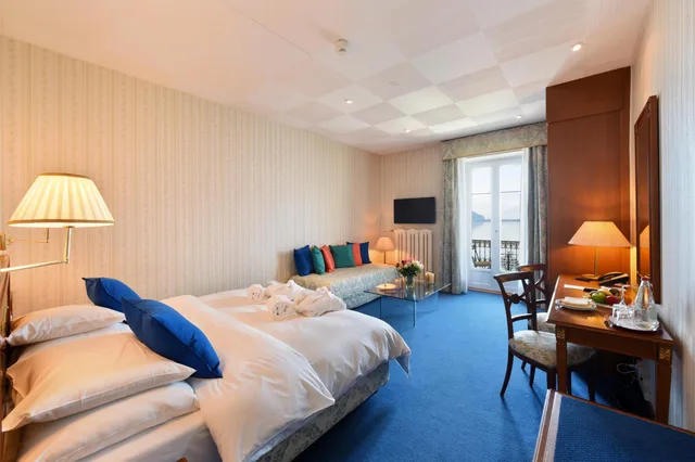 غرفة سوبيريور ثلاثية بسرير فردي بإطلالة على البحيرة، GOLF HOTEL RENE CAPT 7/9