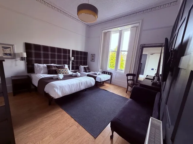 غرفة عائلية بسرير مزدوج وسرير فردي، The International Guest House 10/10
