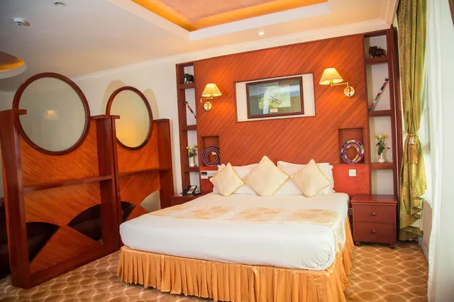 غرفة ديلوكس بسرير مزدوج، Palace Hotel Arusha 1/2