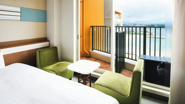 غرفة قياسية رباعية بأربعة أسرّة وسريرين منفصلين بإطلالة على البحر في الملحق، Vessel Hotel Campana Okinawa 4/5