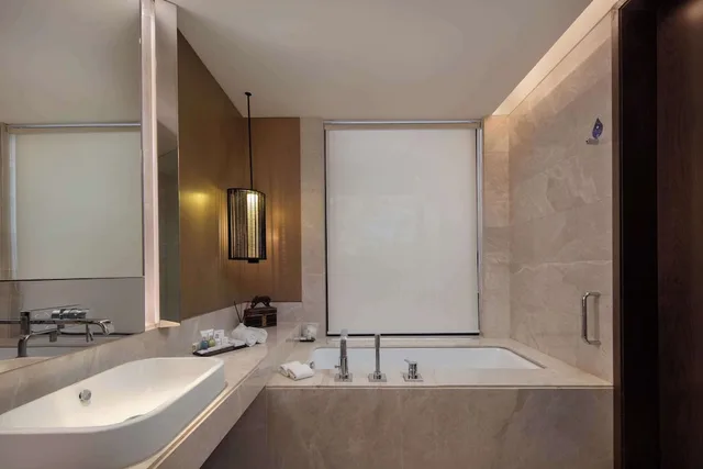 غرفة ديلوكس بإطلالة على المسبح، Radisson Blu Bali Uluwatu 4/8