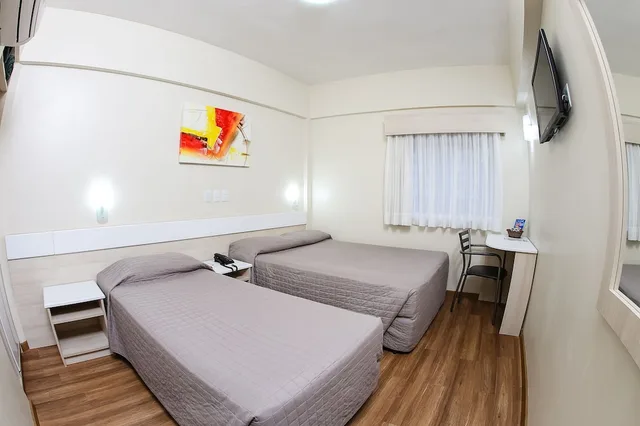 غرفة عائلية ثلاثية بسرير مزدوج وسرير فردي، Hotel Express Rodoviaria 1/2