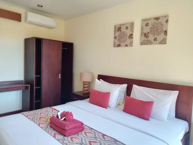 غرفة قياسية بسرير كوين، Sekuta Condo Suites 1/4