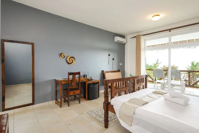 غرفة ديلوكس بسريرين كينج بإطلالة على الحديقة، Tanzanite Beach Resort 1/1