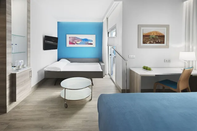 جناح بريستيج جونيور مفردة بسريرين منفصلين مع أريكة، Elba Lanzarote Royal Village Resort 2/5