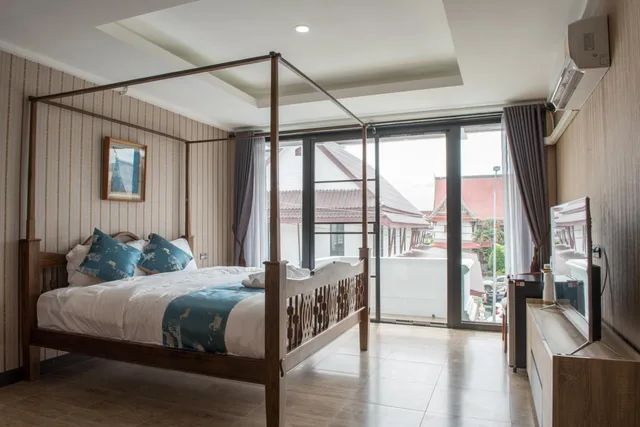 غرفة ديلوكس بسرير مزدوج بشرفة، A Lanna Boutique House 2/2