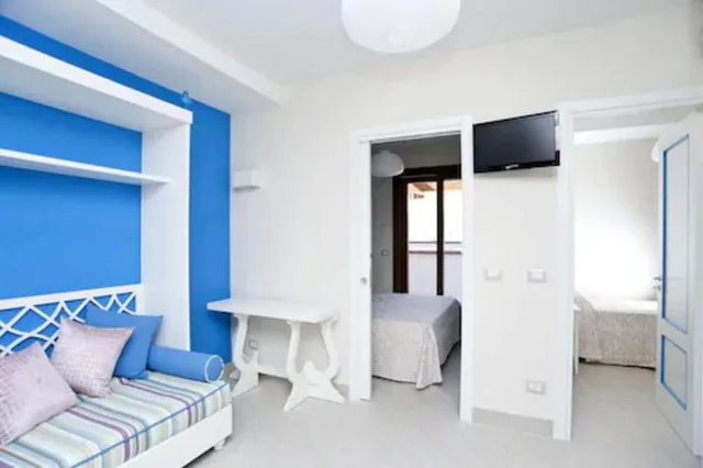 شقة عائلية بسرير كوين وسرير بطابقين بغرفتي نوم، Hotel Residence Il Porto 3/5
