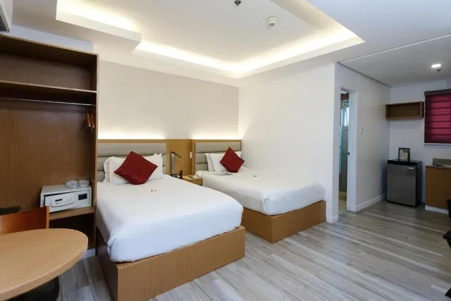جناح كلوب بريفيليج بسريرين منفصلين، Regency Grand Suites 2/5