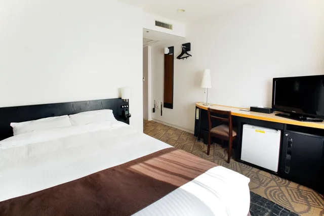 غرفة قياسية صغيرة بسرير مزدوج للمدخنين، Sapporo Tokyu REI Hotel 1/2