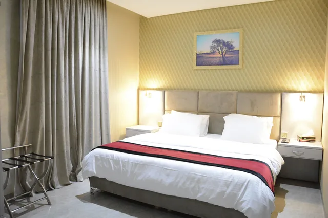 شقة ديلوكس بسرير كينج بإطلالة على المدينة بغرفة نوم واحدة، The 58 Hotel Apartments 1/5