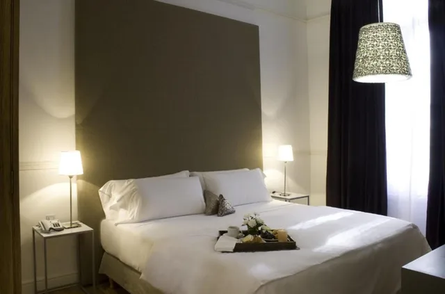 غرفة بسرير كوين، Esplendor By Wyndham Savoy Rosario 2/2