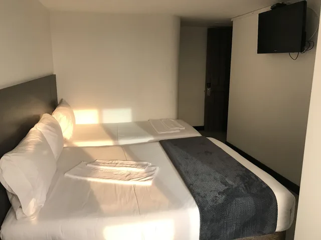 غرفة قياسية ثلاثية بسرير مزدوج وسرير فردي، Hotel Express 53 3/4