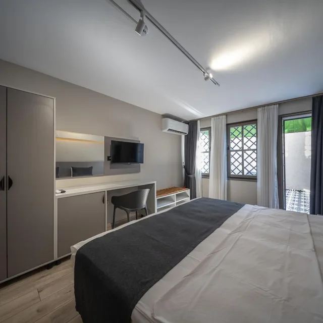 غرفة ديلوكس بسرير مزدوج أو سريرين منفصلين بإطلالة على الحديقة، Calanthe Residence 7/10