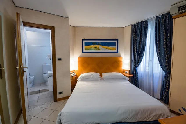 غرفة كلاسيكية بسريرين منفصلين بغرفة نوم واحدة، Albergo Centrale Bologna 1/10