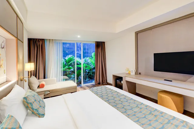 Deluxe, Double Bed, Sunday Hotel Sunset Road Near Trans Studio Mall 2/4