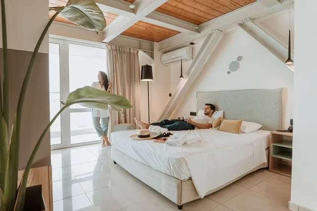 غرفة ثلاثية بسرير مزدوج مع أريكة، Infinity City Boutique Hotel 4/10