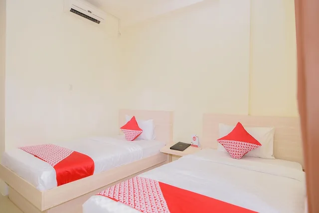 غرفة ديلوكس بسريرين منفصلين، Hotel Capital O 854 Ub Caisar Hotel 1/4