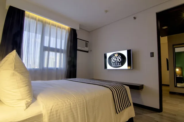 جناح بسرير كوين بغرفة نوم واحدة، 1898 Hotel Colonia En Las Filipinas 2/2