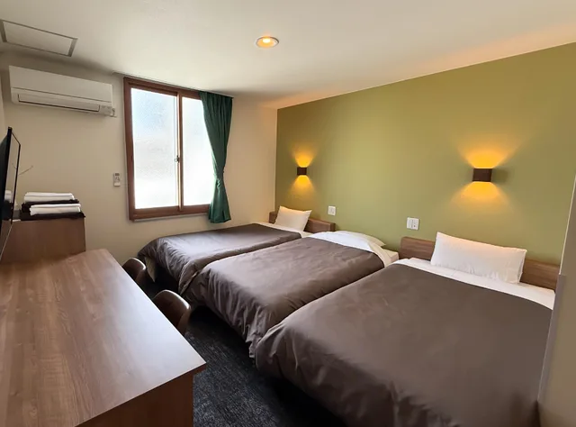 غرفة اقتصادية بسريرين منفصلين مع أريكة، Matsuyama New Grand Hotel 3/3
