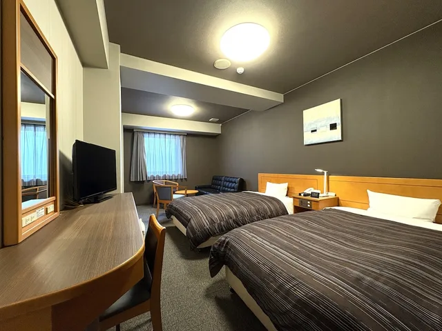غرفة بسريرين منفصلين، Hotel Route-Inn Niihama 1/8