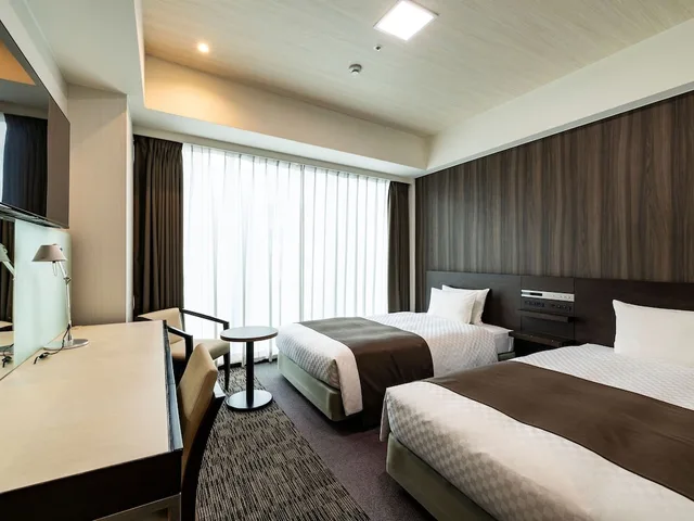 غرفة بسريرين منفصلين بإطلالة، KOKO HOTEL Premier Hakata 1/4