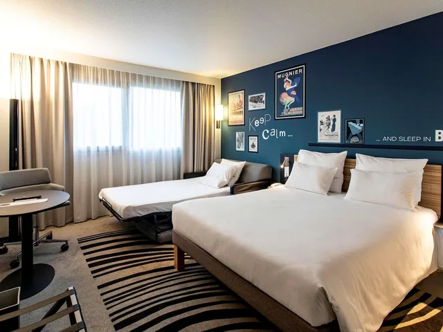 غرفة كلاسيكية بسرير مزدوج مع أريكة، NOVOTEL BEAUNE 7/10