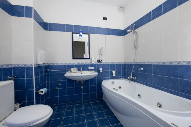 غرفة عائلية ثلاثية، Hotel Baia d'Oro 2/2