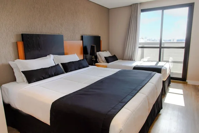 غرفة عائلية ثلاثية بسرير مزدوج وسرير فردي، Slaviero Hotel Curitiba Batel 1/10