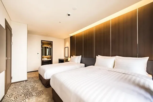 غرفة ملكية بسرير مزدوج وسرير فردي بغرفة نوم واحدة، Hotel Goldendaisy Seogwipo Ocean 2/2