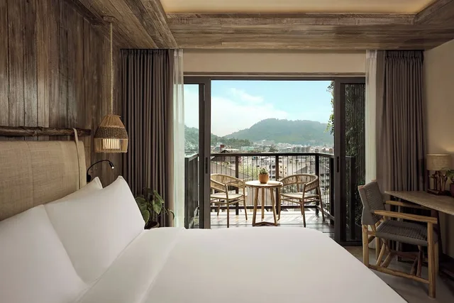 جناح بسريرين منفصلين وسرير كينج بإطلالة على الحديقة بغرفتي نوم، Dinso Resort 14/18