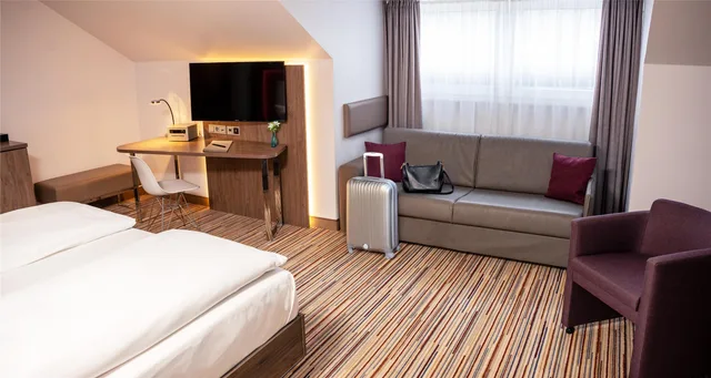 غرفة عائلية بسرير مزدوج مع أريكة، Best Western Plus Hotel Stadtquartier Haan 3/8