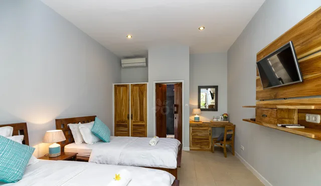 غرفة بسريرين منفصلين بإطلالة على الحديقة، Bale Sampan Bungalows 4/10