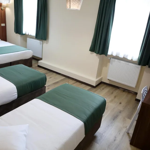 غرفة كومفورت رباعية بسرير فردي، Sun Hotel 1/10